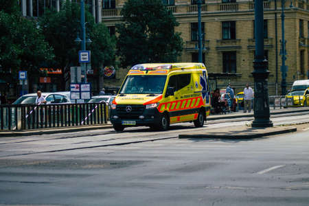 Budapest Hungary july 15, 2020 View of a traditional Hungarian ambulance driving through the streets of Budapest the capital and the most populous city of Hungaryのeditorial素材