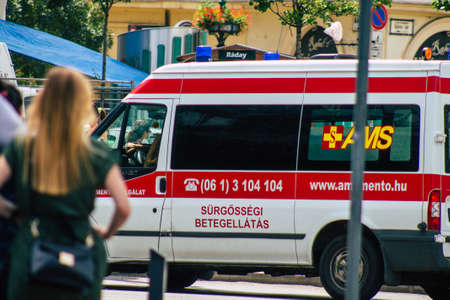 Budapest Hungary july 20, 2020 View of a traditional Hungarian ambulance driving through the streets of Budapest the capital and the most populous city of Hungaryの写真素材