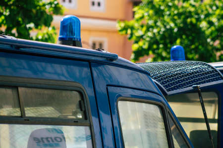 Lisbon Portugal july 24, 2020 View of a classic police car parked front the police station of Lisbon, the coastal capital city of Portugal and one of the stunning oldest cities in Europeの写真素材