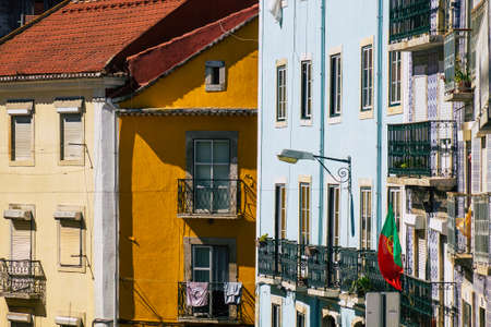 Lisbon Portugal july 24, 2020 View of classic facade of ancient historical buildings in the downtown area of Lisbon, the hilly coastal capital city of Portugal and one of the oldest cities in Europeの写真素材