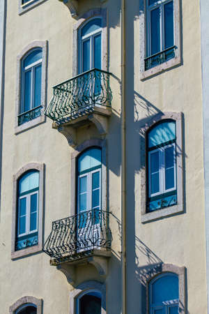 Lisbon Portugal july 24, 2020 View of classic facade of ancient historical buildings in the downtown area of Lisbon, the hilly coastal capital city of Portugal and one of the oldest cities in Europeの写真素材