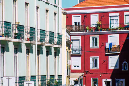 Lisbon Portugal july 24, 2020 View of classic facade of ancient historical buildings in the downtown area of Lisbon, the hilly coastal capital city of Portugal and one of the oldest cities in Europeの写真素材