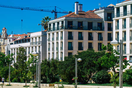 Lisbon Portugal july 24, 2020 View of classic facade of ancient historical buildings in the downtown area of Lisbon, the hilly coastal capital city of Portugal and one of the oldest cities in Europeの写真素材