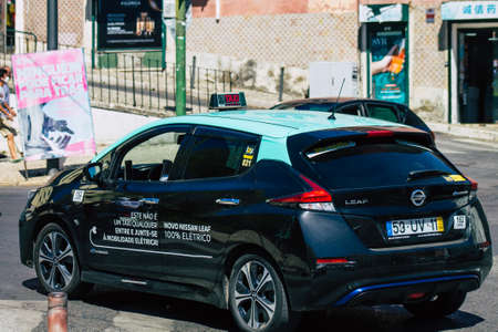 Lisbon Portugal july 24, 2020 View of a taxi for passengers driving through the streets of Lisbon, the hilly coastal capital city of Portugal and one of the stunning oldest cities in Europeのeditorial素材