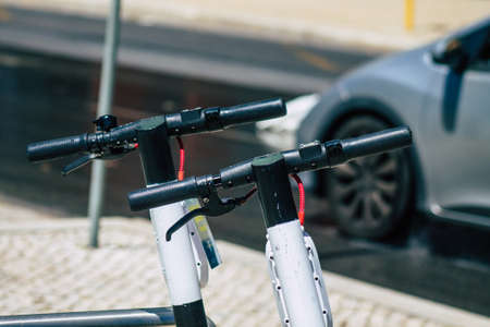 Lisbon Portugal july 25, 2020 View of an electric scooter parked in the streets of Lisbon, operating with a small utility internal combustion engine and a large deck in the centerの写真素材