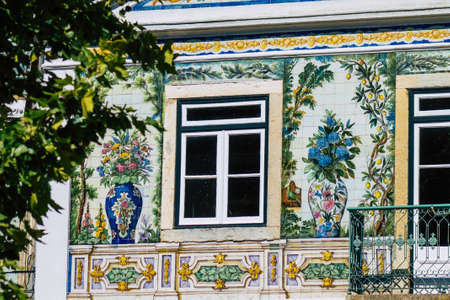 Lisbon Portugal july 25, 2020 View of classic facade of ancient historical buildings in the downtown area of Lisbon, the hilly coastal capital city of Portugal and one of the oldest cities in Europeの写真素材