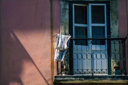 Lisbon Portugal july 25, 2020 View of classic facade of ancient historical buildings in the downtown area of Lisbon, the hilly coastal capital city of Portugal and one of the oldest cities in Europeの写真素材