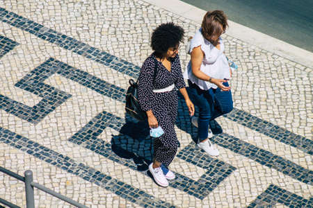 Lisbon Portugal july 25, 2020 View of unidentified pedestrians walking in the streets of the downtown area of Lisbon, the hilly coastal capital city of Portugal and one of the oldest cities in Europeの写真素材