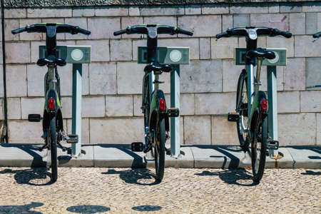 Lisbon Portugal july 25, 2020 View of accessible bicycle to hire for short periods of time, usually for a few hours parked in the street and part of the public transport system of Lisbonの写真素材