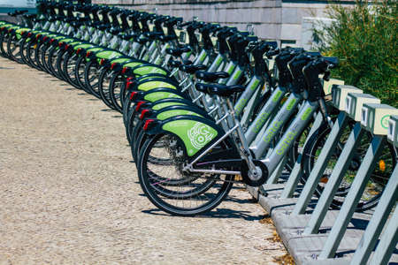 Lisbon Portugal july 25, 2020 View of accessible bicycle to hire for short periods of time, usually...
