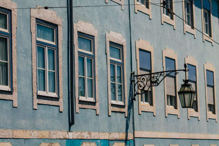 Lisbon Portugal july 26, 2020 View of classic facade of ancient historical buildings in the downtown area of Lisbon, the hilly coastal capital city of Portugal and one of the oldest cities in Europeの写真素材