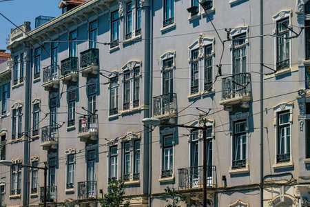 Lisbon Portugal july 26, 2020 View of classic facade of ancient historical buildings in the downtown area of Lisbon, the hilly coastal capital city of Portugal and one of the oldest cities in Europeの写真素材