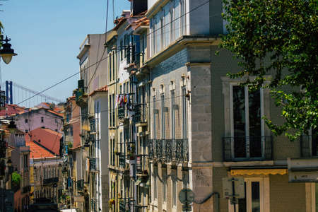 Lisbon Portugal july 26, 2020 View of classic facade of ancient historical buildings in the downtown area of Lisbon, the hilly coastal capital city of Portugal and one of the oldest cities in Europeの写真素材