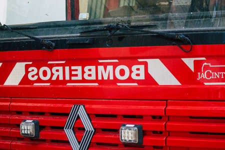 Lisbon Portugal july 26, 2020 View of a fire engine in the streets of Lisbon, the hilly coastal capital city of Portugal and one of the stunning oldest cities in Europeの写真素材