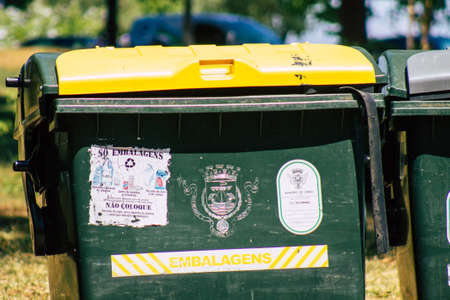 Lisbon Portugal july 27, 2020 Closeup of garbage container in the downtown area of Lisbon, the hilly...