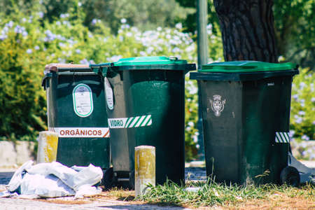 Lisbon Portugal july 27, 2020 Closeup of garbage container in the downtown area of Lisbon, the hilly...