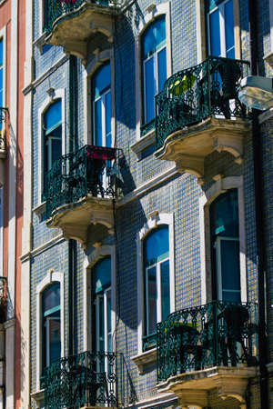 Lisbon Portugal july 29, 2020 View of classic facade of ancient historical buildings in the downtown area of Lisbon, the hilly coastal capital city of Portugal and one of the oldest cities in Europeの写真素材