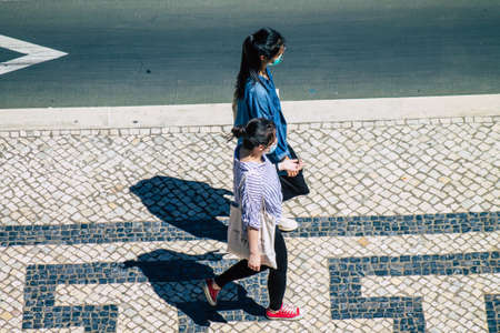 Lisbon Portugal july 25, 2020 View of unidentified pedestrians walking in the streets of the downtown area of Lisbon, the hilly coastal capital city of Portugal and one of the oldest cities in Europeのeditorial素材