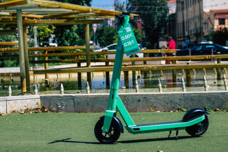 Lisbon Portugal july 25, 2020 View of an electric scooter parked in the streets of Lisbon, operating with a small utility internal combustion engine and a large deck in the centerのeditorial素材