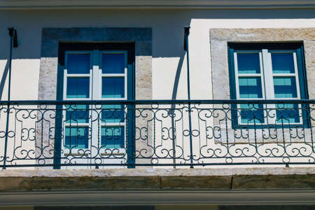 Lisbon Portugal july 30, 2020 View of window on the facade of ancient historical buildings in the downtown area of Lisbon, the coastal capital city of Portugal and one of the oldest cities in Europeの写真素材