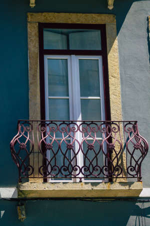 Lisbon Portugal july 30, 2020 View of window on the facade of ancient historical buildings in the...