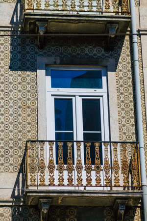 Lisbon Portugal july 30, 2020 View of window on the facade of ancient historical buildings in the...
