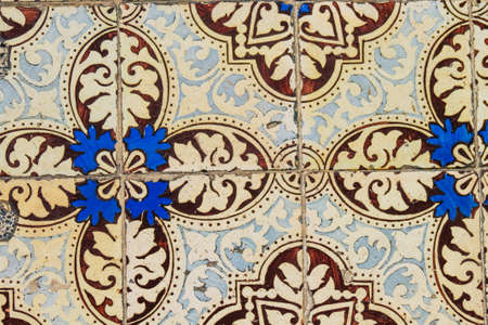 View of mosaic on the facade of ancient historical buildings in the downtown area of Lisbon, the...