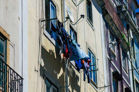 Lisbon Portugal August 01, 2020 View of classic facade of ancient historical buildings in the downtown area of Lisbon, the hilly coastal capital city of Portugal and one of the oldest cities in Europeのeditorial素材
