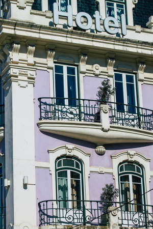 Lisbon Portugal August 01, 2020 View of classic facade of ancient historical buildings in the downtown area of Lisbon, the hilly coastal capital city of Portugal and one of the oldest cities in Europeのeditorial素材