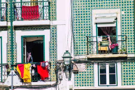 Lisbon Portugal August 01, 2020 View of classic facade of ancient historical buildings in the downtown area of Lisbon, the hilly coastal capital city of Portugal and one of the oldest cities in Europeのeditorial素材