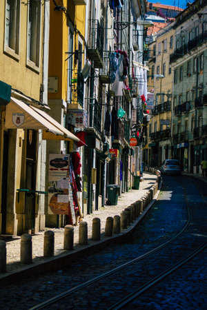 Lisbon Portugal August 01, 2020 View of classic facade of ancient historical buildings in the downtown area of Lisbon, the hilly coastal capital city of Portugal and one of the oldest cities in Europeのeditorial素材