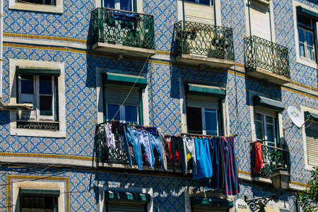 Lisbon Portugal August 01, 2020 View of classic facade of ancient historical buildings in the downtown area of Lisbon, the hilly coastal capital city of Portugal and one of the oldest cities in Europeのeditorial素材