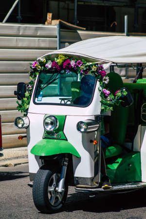 Lisbon Portugal August 01, 2020 View of a tuk tuk for tourists driving through the streets of...