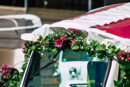 Lisbon Portugal August 01, 2020 View of a tuk tuk for tourists driving through the streets of Lisbon, the hilly coastal capital city of Portugal and one of the oldest cities in Europeのeditorial素材