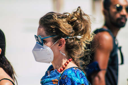 Lisbon Portugal August 01, 2020 View of unidentified pedestrians with a face mask to protect...