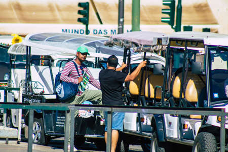Lisbon Portugal August 01, 2020 View of a tuk tuk for tourists driving through the streets of Lisbon, the hilly coastal capital city of Portugal and one of the oldest cities in Europeのeditorial素材