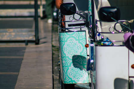 Lisbon Portugal August 01, 2020 View of a tuk tuk for tourists driving through the streets of Lisbon, the hilly coastal capital city of Portugal and one of the oldest cities in Europeのeditorial素材