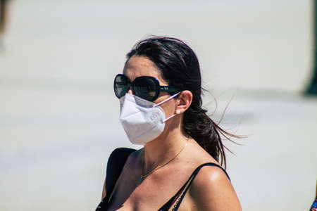 Lisbon Portugal August 01, 2020 View of unidentified pedestrians with a face mask to protect...