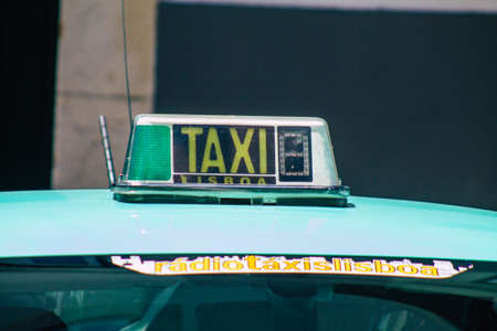Lisbon Portugal August 01, 2020 View of a taxi for passengers parked in the streets of Lisbon, the hilly coastal capital city of Portugal and one of the stunning oldest cities in Europeのeditorial素材
