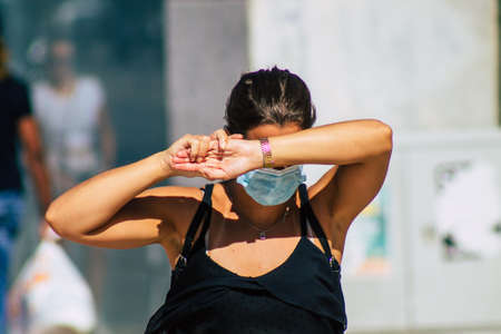Lisbon Portugal August 01, 2020 View of unidentified pedestrians with a face mask to protect...