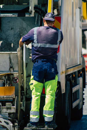 Lisbon Portugal August 04, 2020 View of a garbage truck rolling in the downtown area of Lisbon, the hilly coastal capital city of Portugal and one of the oldest cities in Europeのeditorial素材
