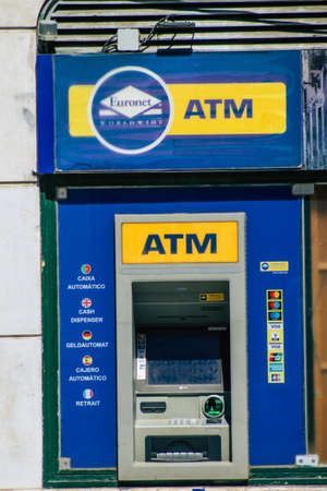 Lisbon Portugal August 04, 2020 View of an ATM located in the streets of Lisbon, the hilly coastal capital city of Portugal and one of the stunning oldest cities in Europeのeditorial素材