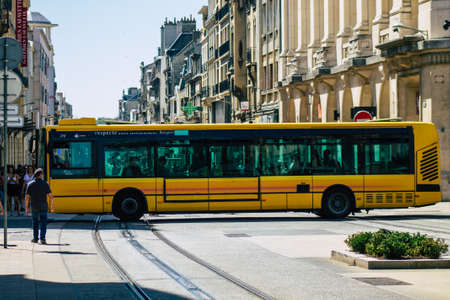 Reims France August 06, 2020 View of a traditional city bus for passengers driving through the streets and part of the public transport system of Reims, a city in the Grand Est region of Franceのeditorial素材
