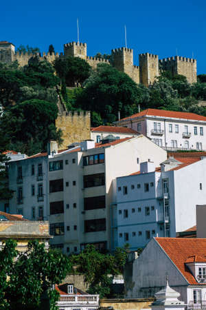 Lisbon Portugal August 03, 2020 View of classic facade of ancient historical buildings in the downtown area of Lisbon, the hilly coastal capital city of Portugal and one of the oldest cities in Europeのeditorial素材