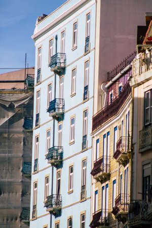 Lisbon Portugal August 03, 2020 View of classic facade of ancient historical buildings in the downtown area of Lisbon, the hilly coastal capital city of Portugal and one of the oldest cities in Europeのeditorial素材