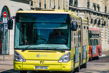 Reims France August 20, 2020 View of a traditional city bus for passengers driving through the streets and part of the public transport system of Reims, a city in the Grand Est region of Franceのeditorial素材