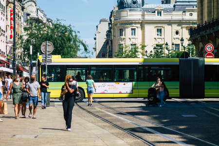 Reims France August 20, 2020 View of a traditional city bus for passengers driving through the streets and part of the public transport system of Reims, a city in the Grand Est region of Franceのeditorial素材