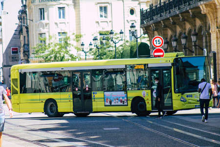 Reims France August 20, 2020 View of a traditional city bus for passengers driving through the streets and part of the public transport system of Reims, a city in the Grand Est region of Franceのeditorial素材