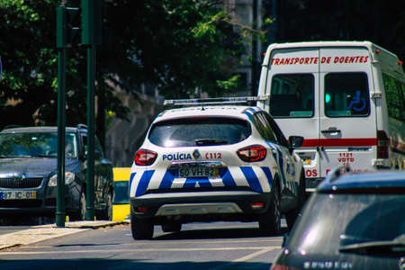 Lisbon Portugal july 28, 2020 View of a classic police car driving through the streets of Lisbon,...