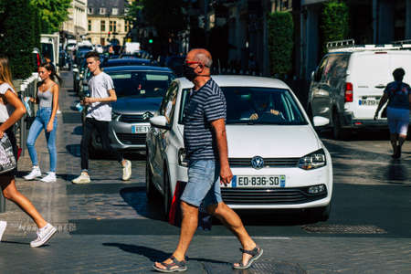 Reims France September 04, 2020 View of unidentified pedestrians with a face mask to protect themself from the coronavirus walking in the streets of Reims, a city in the Grand Est region of Franceのeditorial素材